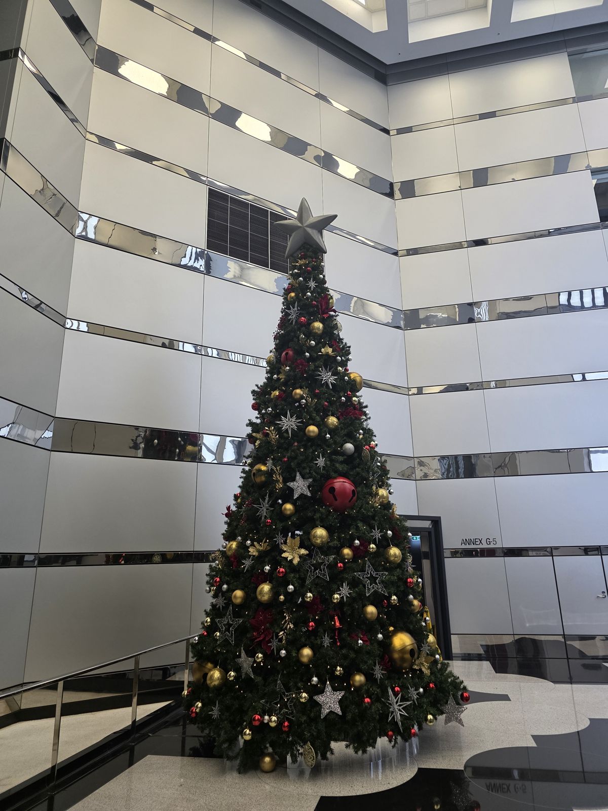 Statement Christmas tree in a multi-storey commercial atrium