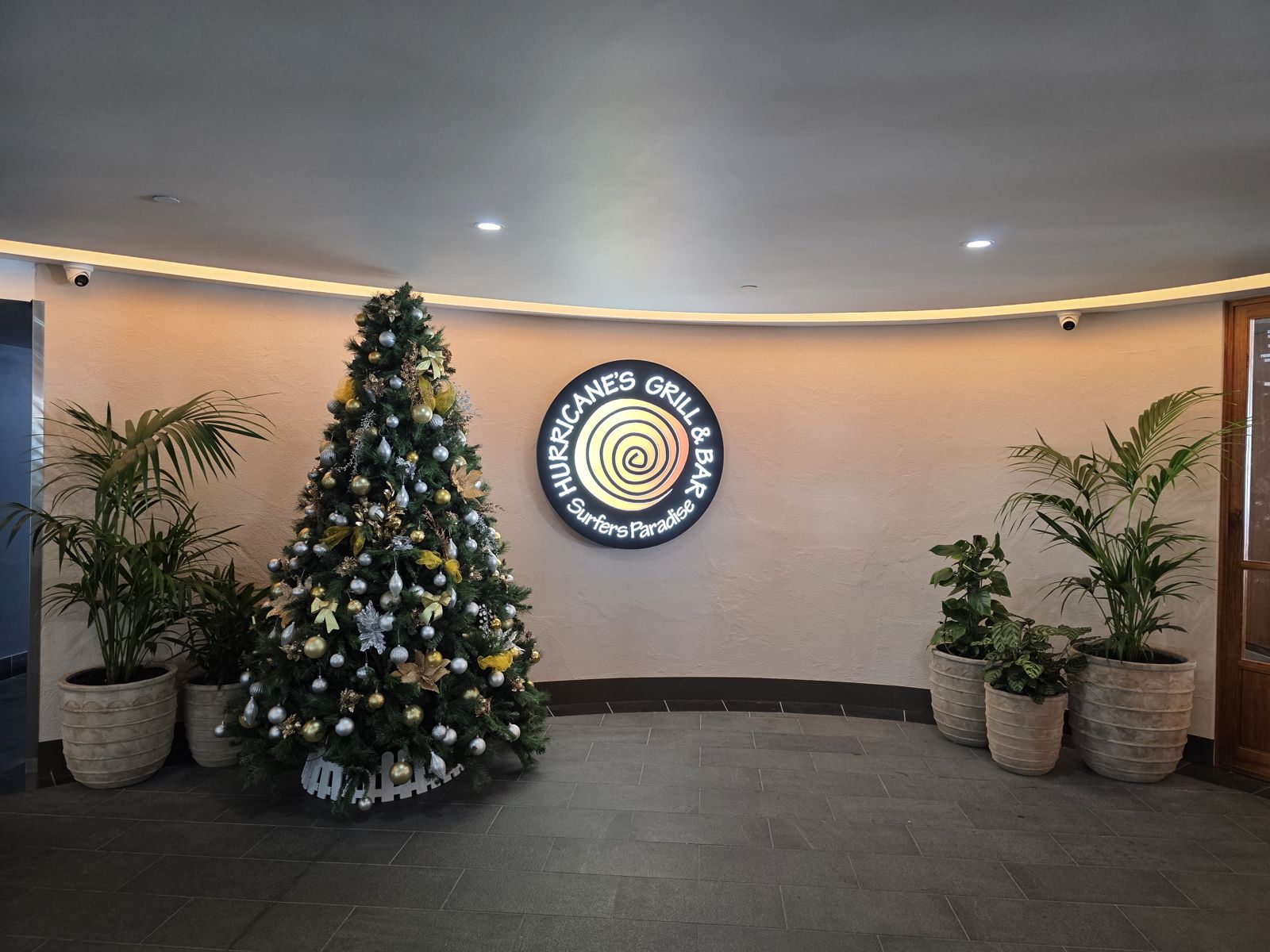 Champagne themed tree in a hospitality foyer